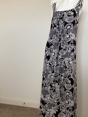 Glamour size 16W, navy blue with white floral/ swirl designs, sleeveless, maxi
